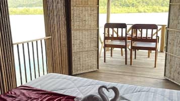 Basic Single Room, Balcony, River View | Living area