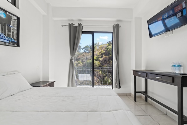 Comfort Room, Balcony, Mountain View | Blackout curtains, iron/ironing board, free WiFi