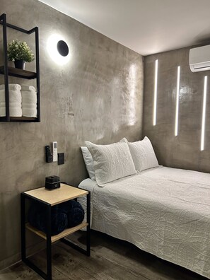 2 slaapkamers, een strijkplank/strijkijzer, beddengoed