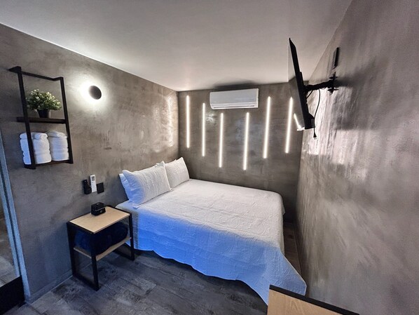 2 habitaciones, tabla de planchar con plancha y ropa de cama 