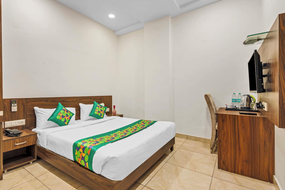 Standard Room | Individually furnished, desk, blackout drapes, iron/ironing board