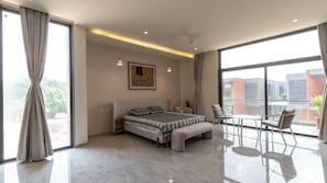 Family Studio Suite, 1 King Bed, Balcony | 1 bedroom, iron/ironing board, free WiFi