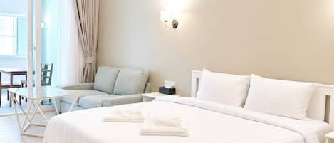 Chambre Deluxe double | Lit dâappoint (supplĂ©ment), accĂšs au Wi-Fi (inclus), literie fournie