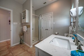 Shower, hair dryer, towels