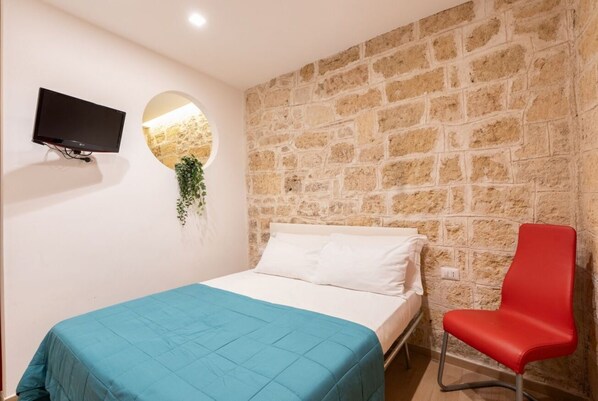 1 chambre, fer et planche à repasser, Wi-Fi, literie fournie