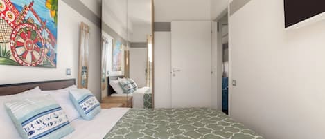 Une chambre à coucher avec un lit, des oreillers, un tableau et une porte.