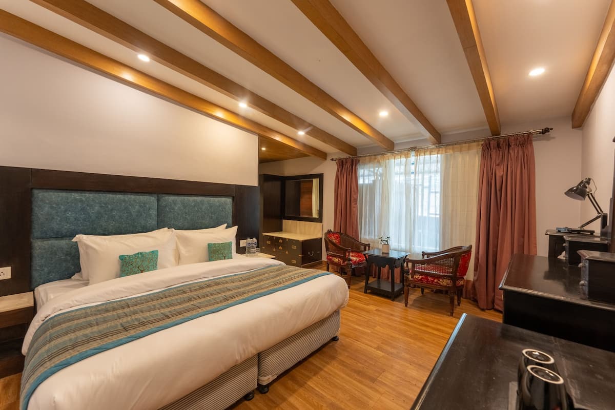 Quadrupla Deluxe | Minibar con snack e bevande gratuite, insonorizzazione