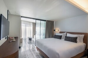 Studio Suite Junior, balkon | Seprai premium, bantalan ekstra lembut, minibar, dan brankas