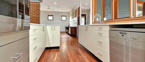 Microwave, stovetop, dishwasher, coffee/tea maker