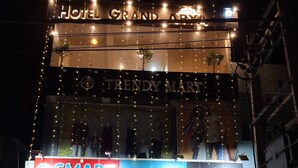 A hotel named 'Hotel Grand Aria' with a visible 'Trendy Mart' store below. - Hotel Grand Arya (Hilsa)