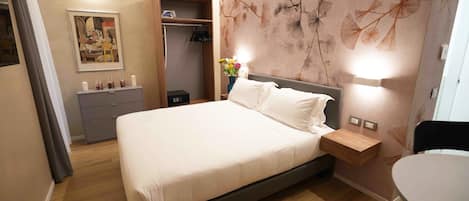 Departamento, cocina | 1 habitación, edredón y caja de seguridad en la habitación