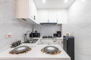 Apartment, Private Pool, City View | Private kitchen | Espresso maker, coffee/tea maker, electric kettle, toaster