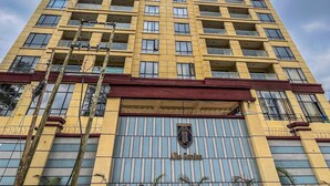 A high-rise building with multiple balconies and a gated entrance. - Alba Garden (Nairobi)