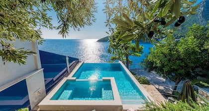 Secluded Beachfront Villa: 3 Bedrooms, Private Pool, and Natural Serenity