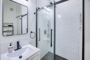 Shower, jetted tub, hair dryer, bidet