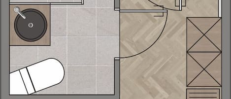 A hotel room layout with a bed, bedside tables, a sofa, a small table, and a chair.