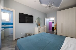 3 chambres, fer et planche à repasser, lit de bébé portatif