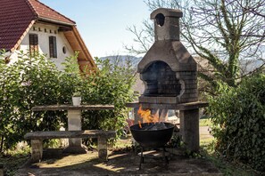 Outdoor dining - 48m² Apartment In Peaceful Nature with AC, KS Bed, Full Kitchen, and Balcony (Mozirje)