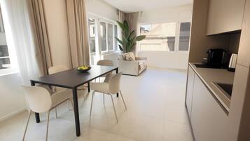 Superior Studio Suite, City View | Free minibar, desk, laptop workspace, free WiFi