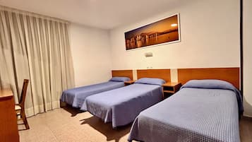 Triple Room | Egyptian cotton sheets, premium bedding, desk, blackout drapes