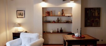 Comfortable living on a farm surrounded by greenery and art