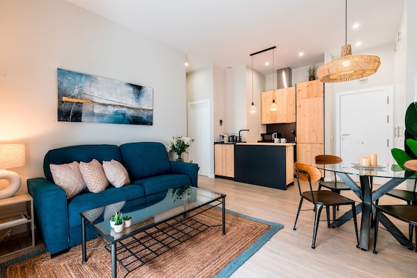 Apartment (1 Bedroom) | Living room | 52-inch Smart TV with satellite channels