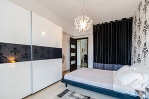 2 slaapkamers, een kluis op de kamer, een strijkplank/strijkijzer