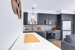 Condo, 1 Double Bed with Sofa bed, Balcony, City View (Hill Country Modern) | Private kitchen | Fridge, microwave, oven, stovetop - Modern Hill Country Condo for 4 w/ Resort Perks! (New Braunfels)