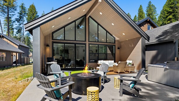 A modern house with a large deck, outdoor seating, and a fire pit. - Private Hot Tub & Patio: Spacious Cle Elum Home (Cle Elum)