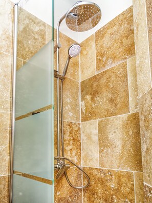 Shower, towels, soap, toilet paper