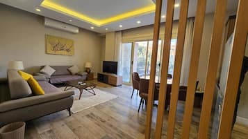 Elite appartement | Woonruimte | Flatscreentelevisie