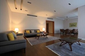 Apartament de luxe | Sala d'estar | Televisor de pantalla plana 