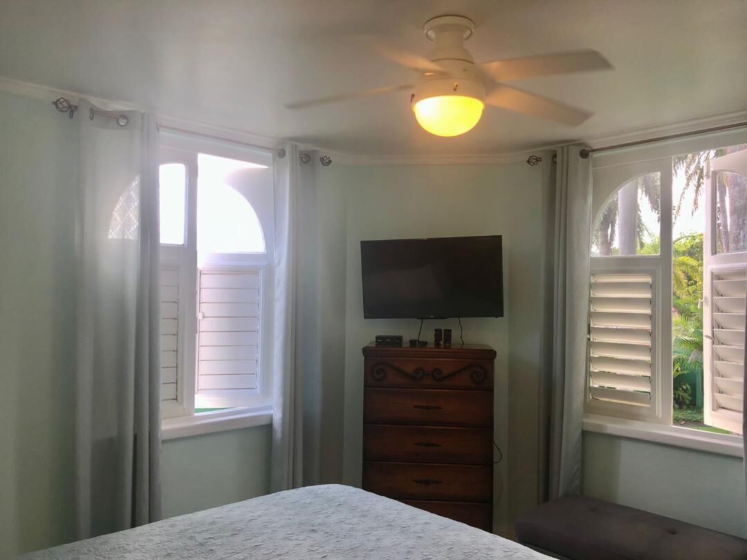 1 bedroom, desk, iron/ironing board, travel crib