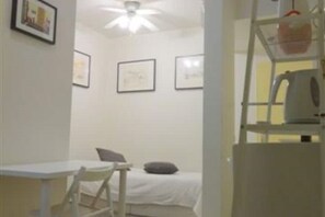 Desk, iron/ironing board, travel cot, free WiFi