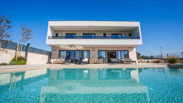 A modern two-story house with a swimming pool in front. - Villa Freedom (Vodice)