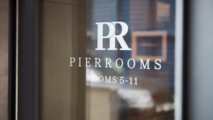 A window with the text "PIERROOMS ROOMS 5-11" indicating the rooms available in this hotel section. - The Pierrooms (Oban)