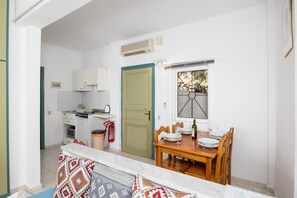 Apartment, 1 Bedroom, Balcony, Sea View | Private kitchenette | Mini-fridge, stovetop, cookware/dishes/utensils
