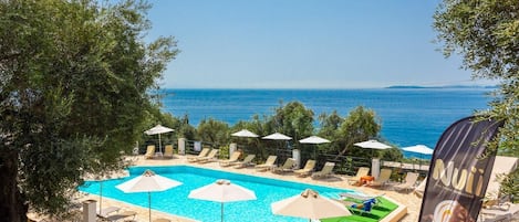 Outdoor pool, open 9:00 AM to 7:00 PM, pool umbrellas, pool loungers