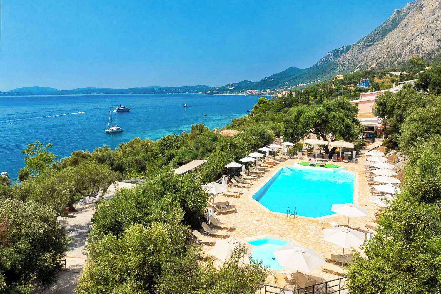 Outdoor pool, open 9:00 AM to 7:00 PM, pool umbrellas, sun loungers