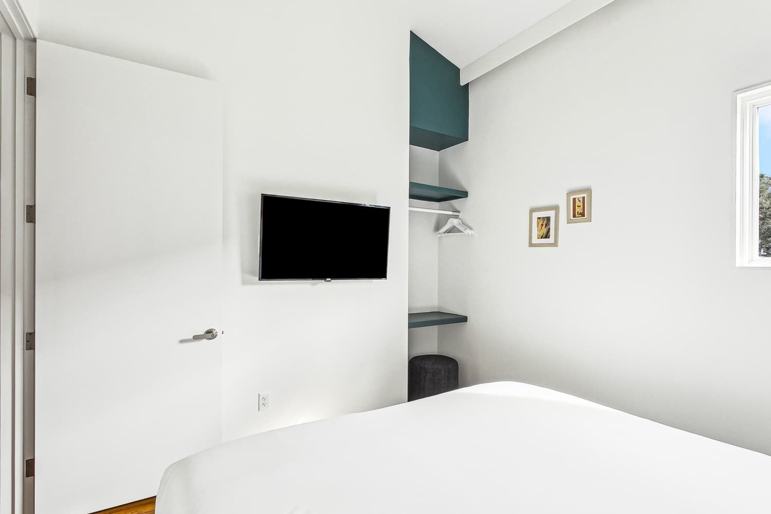 Bedroom 2 has a TV.