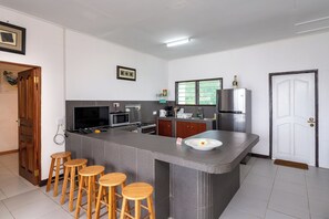 Apartment, 2 Bedrooms, Sea View | Private kitchen | Microwave, oven, stovetop, electric kettle
