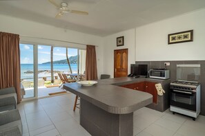 Apartment, 2 Bedrooms, Sea View | Living area | Flat-screen TV - Beach Cove (Bel Ombre)