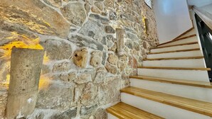 A stone wall adjacent to a wooden staircase. - Pet-Friendly Holiday Home Lara with Pool and Sea view - excellent choice for a relaxing family getaway (Brzac)