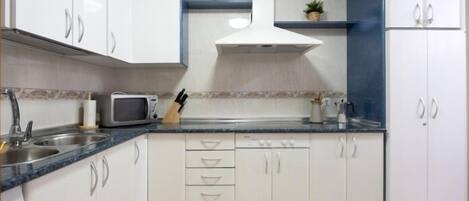 Fridge, microwave, coffee/tea maker, toaster