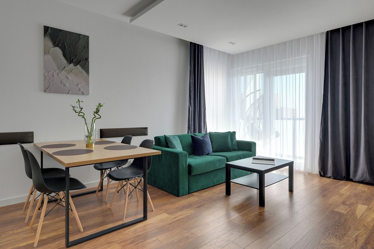 Superior Apartment, 2 Bedrooms, Balcony | Living area | 50-inch flat-screen TV with cable channels