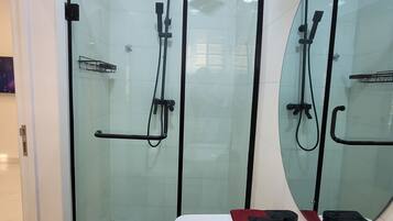 Shower, jetted tub, hair dryer, bidet