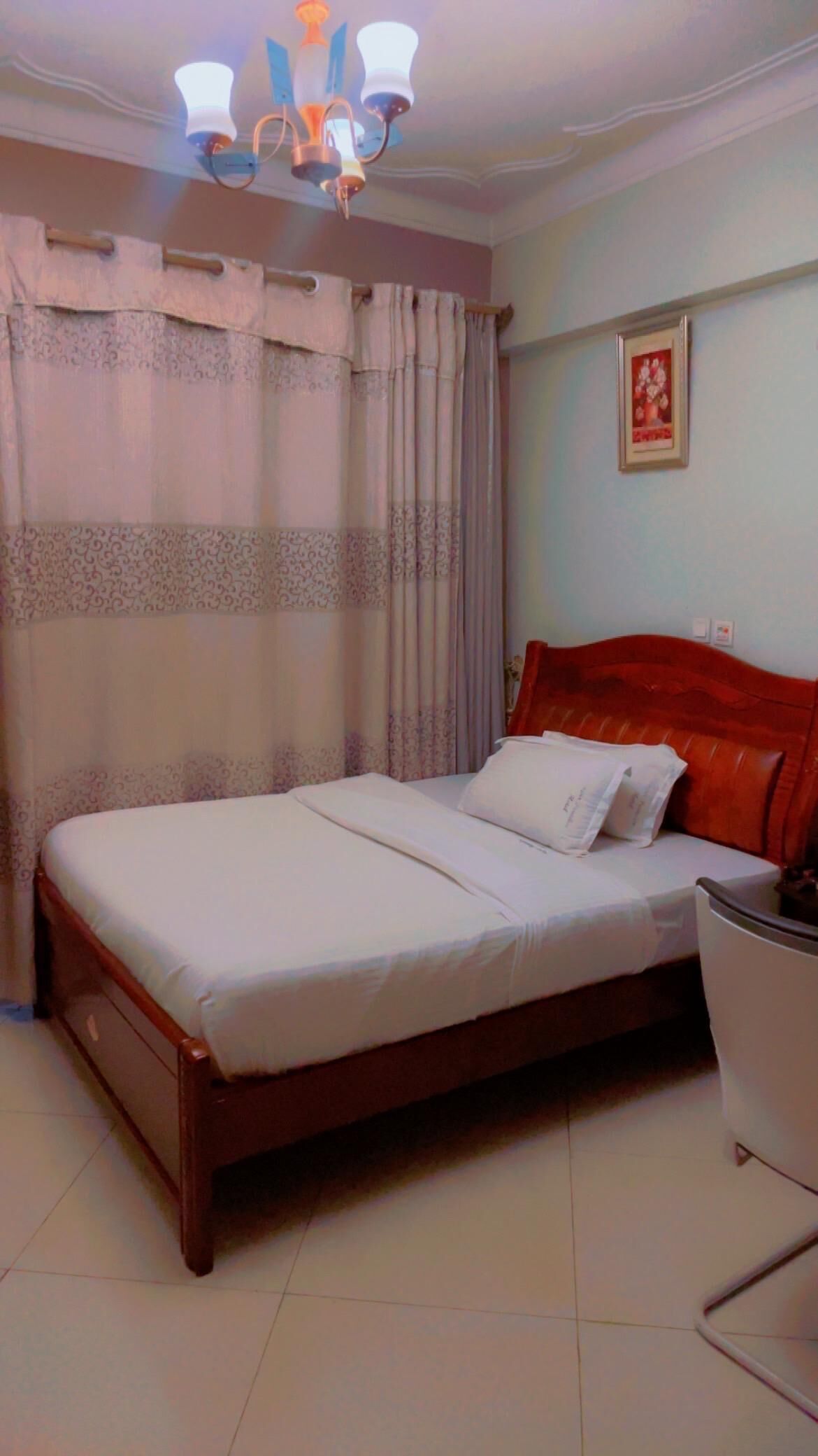 Individually decorated, desk, laptop workspace, iron/ironing board