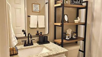 Hair dryer, towels, soap, toilet paper