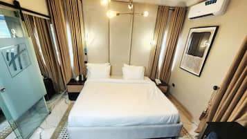 Egyptian cotton sheets, premium bedding, down duvets, memory-foam beds