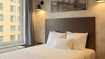 Deluxe Room | 1 bedroom, down duvets, memory-foam beds, desk